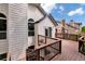 Wooden deck with stairs and railing for outdoor enjoyment in this home at 9371 Princeton Ln, Highlands Ranch, CO 80130
