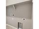 Laundry room with built-in shelving and hookups at 16850 Mckay Dr, Mead, CO 80542