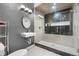 Modern bathroom featuring a glass-enclosed shower and sleek fixtures providing a spa-like experience at 11193 Mission Walk St, Parker, CO 80134