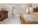 Bedroom featuring a queen-sized bed with decorative headboard and ample natural light at 11193 Mission Walk St, Parker, CO 80134