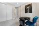 Bright bedroom with a desk area and closet at 11193 Mission Walk St, Parker, CO 80134