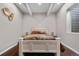 This bedroom is furnished with decorative gold embellishments and has recessed ceiling lights at 11193 Mission Walk St, Parker, CO 80134