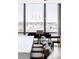 Dining area with pendant lighting and city view at 3100 E Cherry Creek South Dr # 1201, Denver, CO 80209