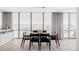 Bright dining room featuring modern lighting and a large window with panoramic views of the city skyline at 3100 E Cherry Creek South Dr # 1201, Denver, CO 80209