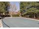 Covered pool surrounded by mature trees and fencing for privacy at 3100 E Cherry Creek South Dr # 1201, Denver, CO 80209