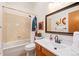 Clean bathroom with a shower/tub combo and updated vanity at 749 Poppy Dr, Brighton, CO 80601