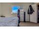 Cozy bedroom with a window at 3354 S Flower St # 14, Lakewood, CO 80227