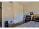 Bedroom featuring a neutral color scheme, a window with blinds, and comfortable carpet at 3354 S Flower St # 14, Lakewood, CO 80227