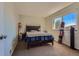 Bedroom with a large window and a bed at 3354 S Flower St # 14, Lakewood, CO 80227