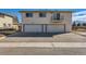 Apartment building with garages and parking. Located in the suburbs at 3354 S Flower St # 14, Lakewood, CO 80227