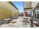 A clean backyard patio, perfect for relaxing or entertaining guests at 9715 Taylor River Cir, Littleton, CO 80125