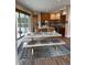 Open dining area with stylish decor and patio access at 9715 Taylor River Cir, Littleton, CO 80125
