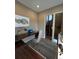 Modern home office with built-in desk, stylish decor, and ample natural light at 9715 Taylor River Cir, Littleton, CO 80125