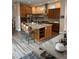 Spacious kitchen with a large island, stainless steel appliances, and rich wood cabinetry at 9715 Taylor River Cir, Littleton, CO 80125