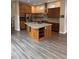 Beautiful kitchen features a large island, stainless steel appliances, and lots of cabinet space at 9715 Taylor River Cir, Littleton, CO 80125