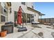 Covered patio area with sliding glass doors into the home at 9715 Taylor River Cir, Littleton, CO 80125