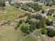 Expansive aerial view of a lush property featuring mature trees and well-maintained landscaping in a suburban setting at 12196 W Belleview Dr, Littleton, CO 80127