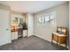 Neutral bedroom with windows with shutters, desk, carpet flooring and classic style furniture at 2609 S Dahlia St, Denver, CO 80222
