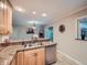 Bright kitchen with granite countertops, stainless steel appliances, and an open layout perfect for cooking at 2609 S Dahlia St, Denver, CO 80222