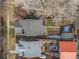 Overhead view of houses with nice yards, mature trees, and some snow on the ground at 2318 S Lincoln St, Denver, CO 80210