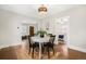 Charming dining room featuring a chandelier and views to other rooms at 2318 S Lincoln St, Denver, CO 80210