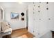 Hallway featuring hardwood floors, built-in storage cabinets and natural light at 2318 S Lincoln St, Denver, CO 80210