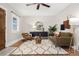 Comfortable living room with hardwood floors, stylish furniture, and natural light at 2318 S Lincoln St, Denver, CO 80210