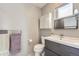 Modern bathroom with sleek vanity, toilet, and neutral color scheme at 3931 Utica St, Denver, CO 80212