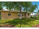 Charming home with lush green lawn and mature trees create a welcoming curb appeal at 5573 S Datura St, Littleton, CO 80120