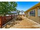 Spacious deck with outdoor seating, beautiful views, and ample space for entertaining at 5573 S Datura St, Littleton, CO 80120