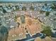 Aerial view showcasing the community with mature trees and manicured walking paths at 2132 S Scranton Way, Aurora, CO 80014