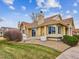 Charming townhome with manicured lawn and inviting curb appeal at 2132 S Scranton Way, Aurora, CO 80014