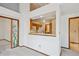 Kitchenette area featuring oak cabinets and white appliances at 2132 S Scranton Way, Aurora, CO 80014