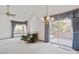 The living room has sliding glass doors, fireplace and ceiling fan at 2132 S Scranton Way, Aurora, CO 80014