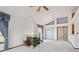 Open living room with bright interior design and a cozy fireplace at 2132 S Scranton Way, Aurora, CO 80014