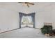 Spacious living room featuring plush carpet and fireplace at 2132 S Scranton Way, Aurora, CO 80014