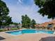 Inviting community swimming pool with lounge chairs at 2132 S Scranton Way, Aurora, CO 80014