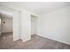 Well-organized bedroom with neutral carpet, fresh paint, a wardrobe, and built-in storage, offering ample space at 5549 S Greenwood St, Littleton, CO 80120