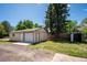 Detached two-car garage with ample parking and storage space, plus mature shade tree at 5549 S Greenwood St, Littleton, CO 80120