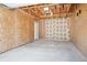 Spacious garage interior ready for customization or storage with access door at 5549 S Greenwood St, Littleton, CO 80120