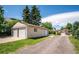 Spacious detached three-car garage and additional storage unit behind a charming home, great for storage at 5549 S Greenwood St, Littleton, CO 80120