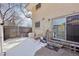 A private backyard includes a storage shed, a brick house exterior, a yard and a sliding glass door at 12531 W Alameda Dr, Lakewood, CO 80228