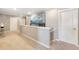 Upstairs hallway with carpet, neutral walls, and doors to bedrooms at 9902 Cathay St, Commerce City, CO 80022