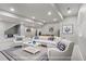Spacious finished basement offering a comfortable seating area perfect for relaxation at 3745 Spanish Oaks Trl, Castle Rock, CO 80108