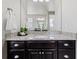 Bathroom featuring granite counters, dark wood cabinets, and a vessel sink at 3745 Spanish Oaks Trl, Castle Rock, CO 80108