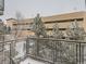 Balcony with metal railing offers natural views in the foreground at 9079 E Panorama Cir # 309, Englewood, CO 80112