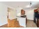 Kitchen with breakfast bar, dark countertops, tile floor and modern lighting at 9079 E Panorama Cir # 309, Englewood, CO 80112