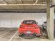 Garage with white doors and painted numbers, in a well-lit parking area at 9079 E Panorama Cir # 309, Englewood, CO 80112