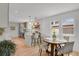 Bright, modern kitchen with island seating, stainless steel appliances, and open layout at 6620 S Foresthill St, Littleton, CO 80120