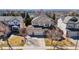 Aerial view of a well-maintained home with mature landscaping and a spacious driveway at 6445 S Telluride St, Aurora, CO 80016